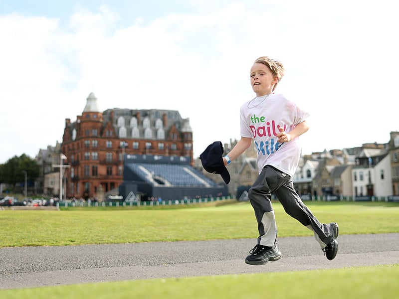 A Daily Mile runner races across the Old Course.