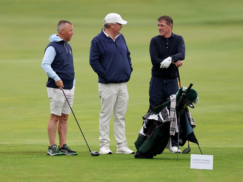 Champion jockey AP McCoy chats strategy during his practice round.