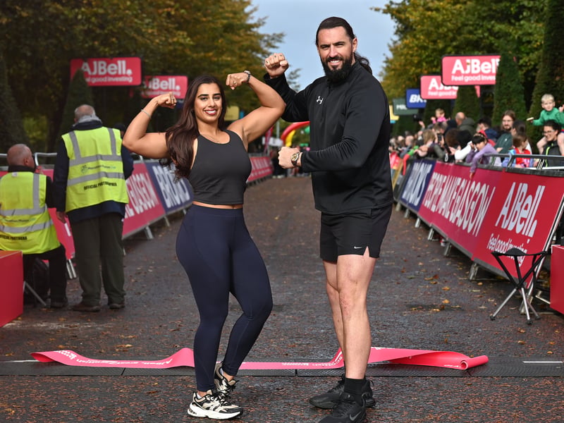Two stars from the hit TV show Gladiators Athena and Hammer at the finish line.


