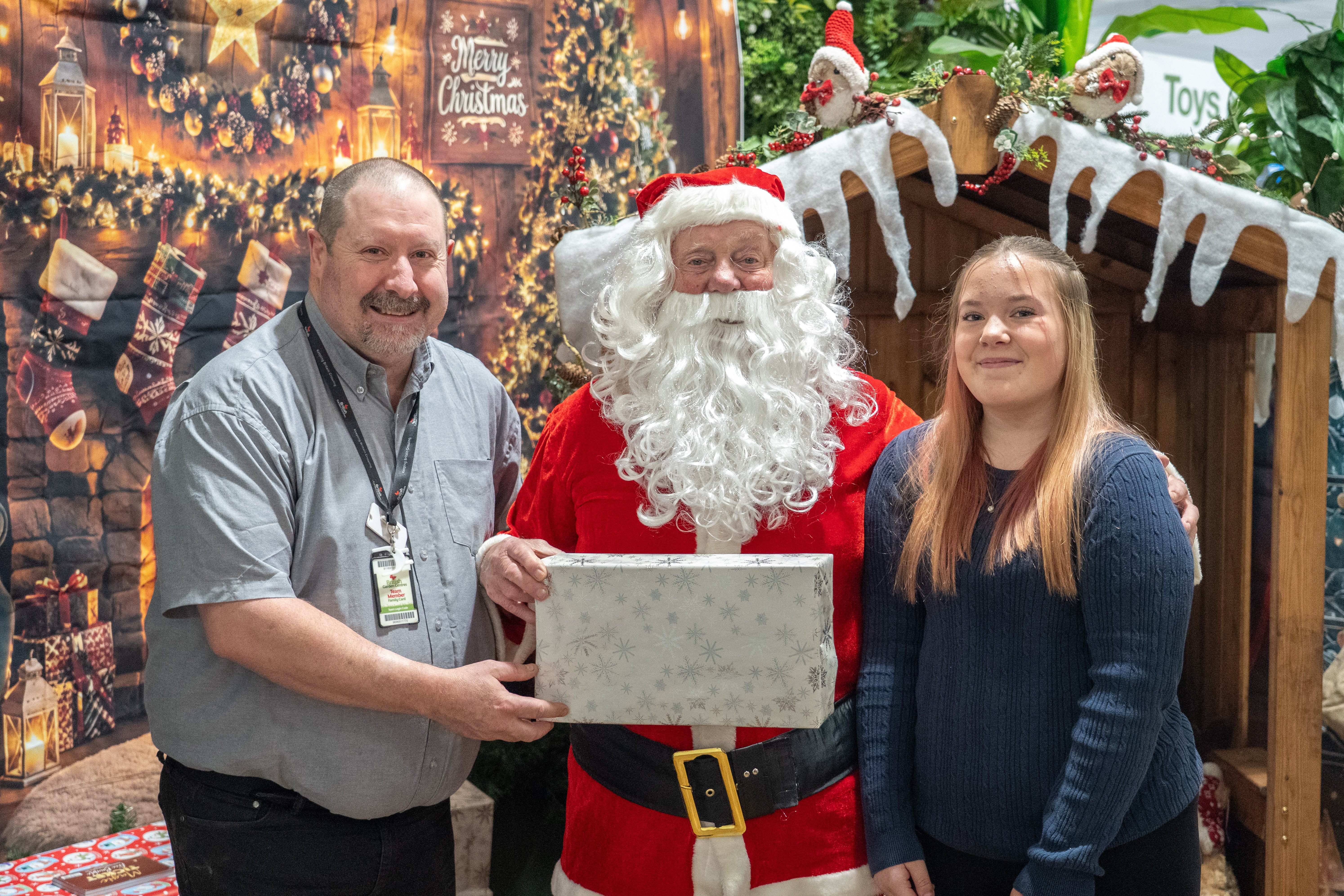Havant Garden Centre Xmas Area in Havant.  David Craighead, Santa and Primrose Edwards. Picture: Alec Chapman