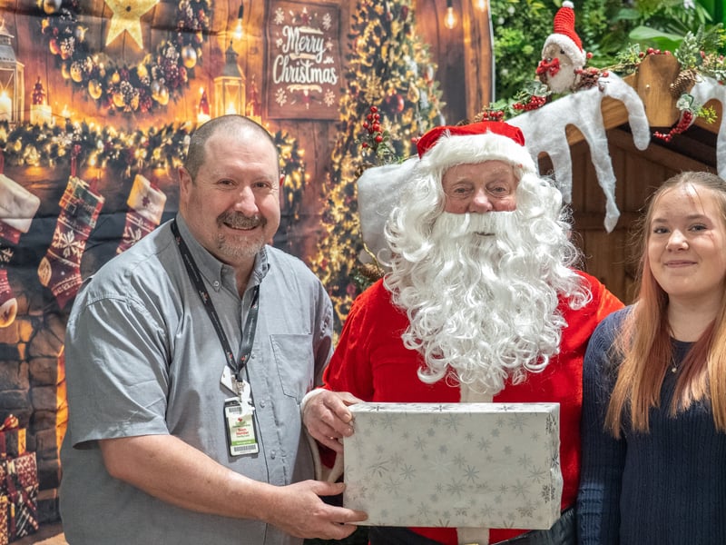 Havant Garden Centre Xmas Area in Havant.  David Craighead, Santa and Primrose Edwards. Picture: Alec Chapman