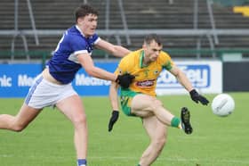 Corofin's Liam Silke in action against and Dara Walsh of Killannin in the group stages of this year's championship