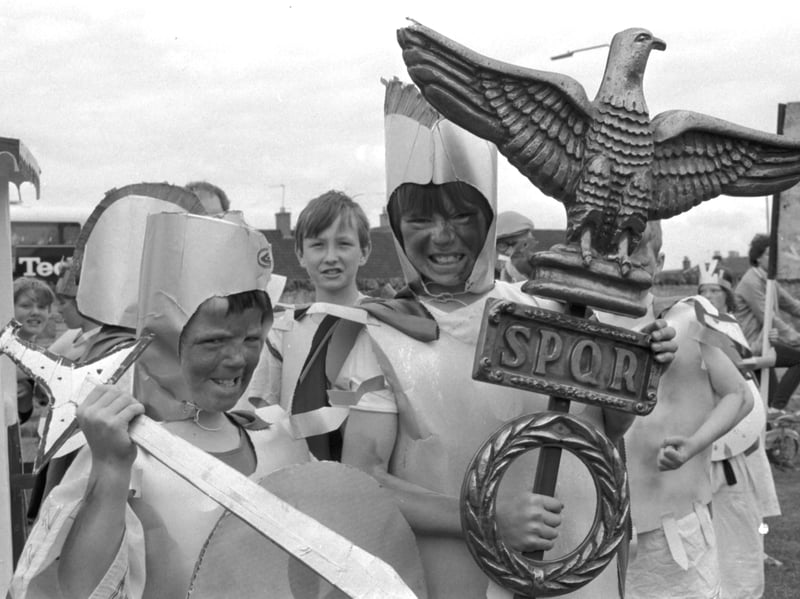 Boys dressed as Roman legionnaires for the Egyptian-themed pageant opening Craigmillar festival, Edinburgh, June 1984.