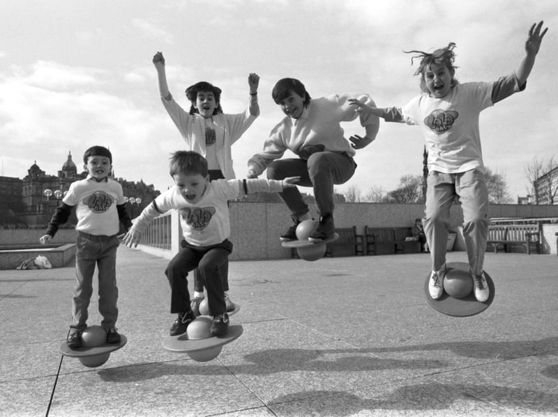 Lisa Coupar (right) and her young friends demonstrate the new Lolobal, an inflatable ball with a foot platform, at the Waverley market shopping centre on Princes Street Edinburgh, April 1986.