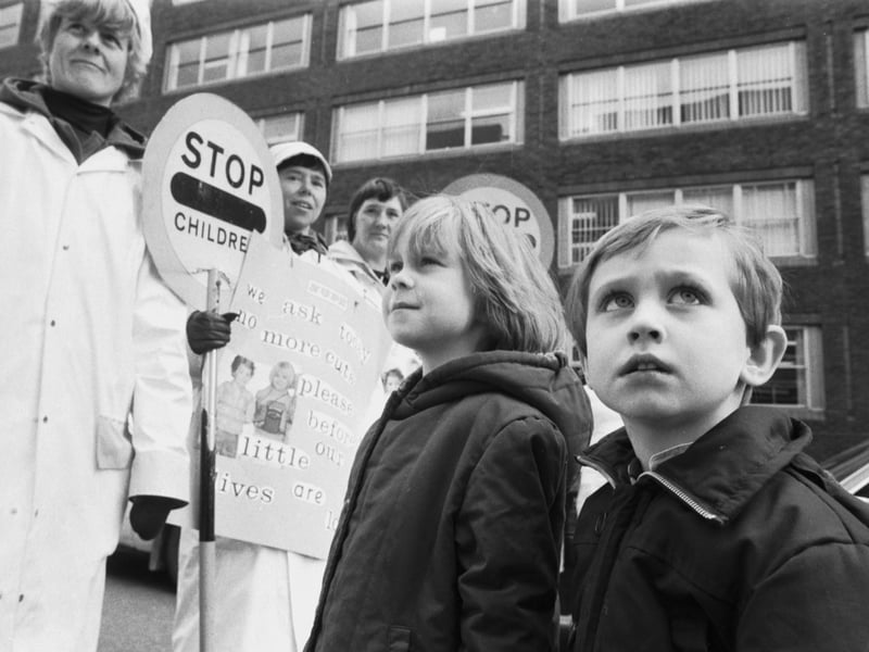 Youngsters Sarah Scobie and David White at a demonstration by Edinburgh school crossing patrols, voicing fears that cuts to their hours could put children at risk, March 1985.