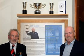 Joe Lyons (right) with captain of Galway Golf Club, John Power.