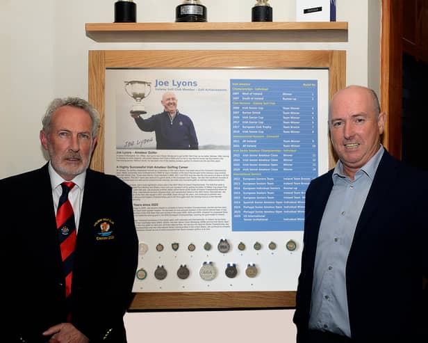 Joe Lyons (right) with captain of Galway Golf Club, John Power.