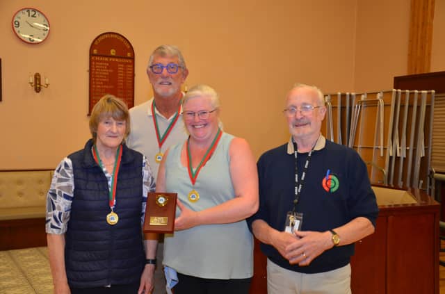 Smiles from the winners of the Plate competition. Included are (from left) Angela Marley, Tom Lithco and Denise Lindsay. The presentation was made by Eddie Boyle (far right), the Club chairperson.