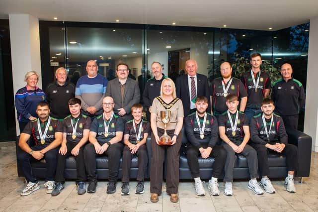 Mayor of Causeway Coast and Glens, Councillor Dawn Huggins with players, committee members and supporters of Ballyspallen Cricket Club.