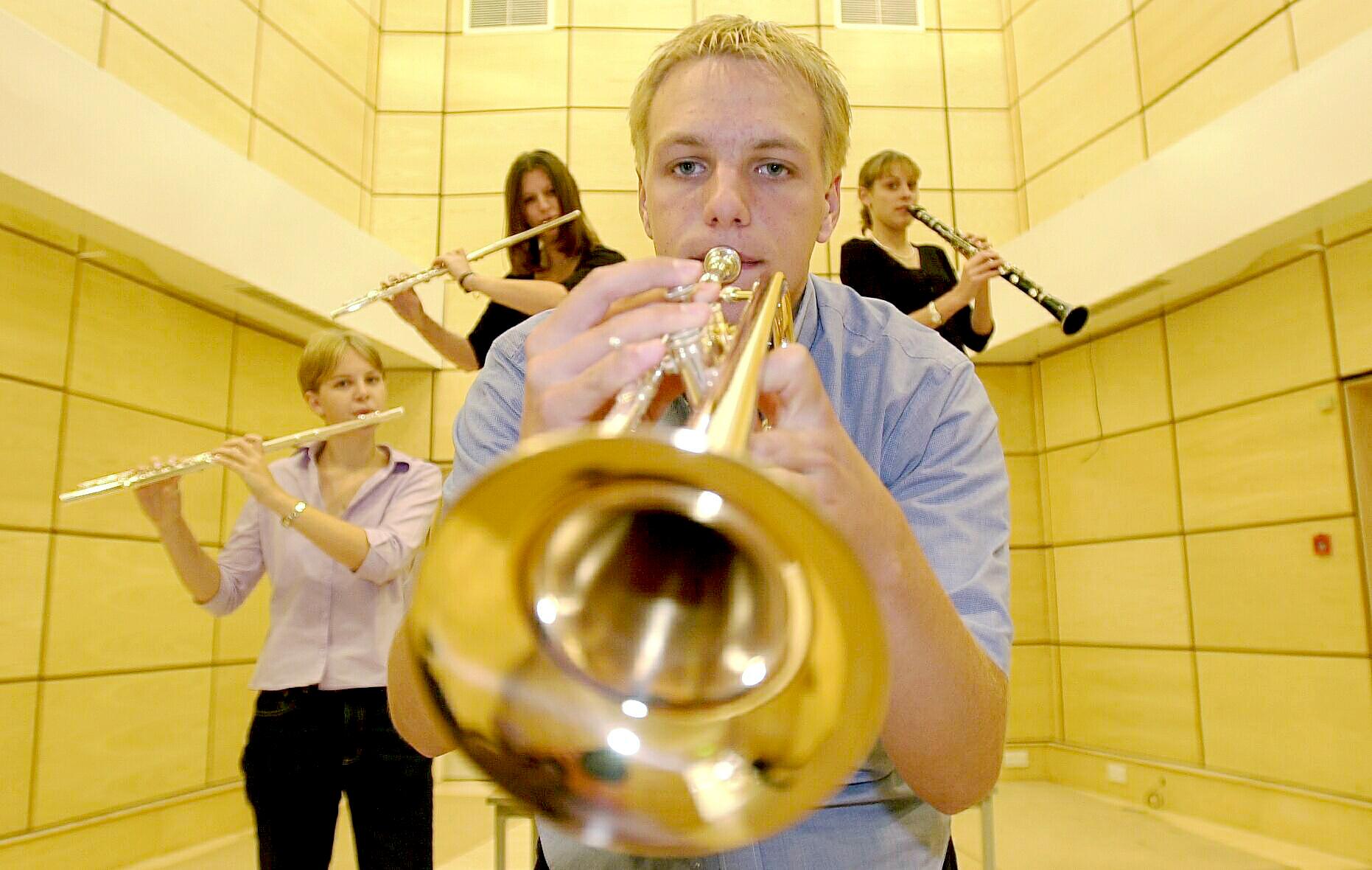 Matt Woods and other music students test out the new music room which will be used for performance at South Downs College.
Picture: Luke MacGregor