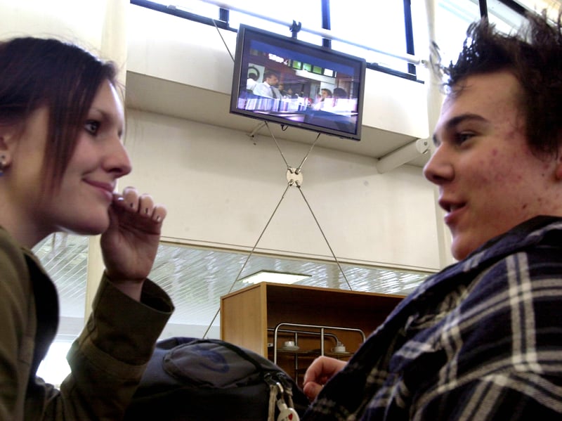 Students at South Downs College Courtyard Cafe can now watch a plasma screen television in February 2004.
Picture: Jonathan Brady (041020-38)