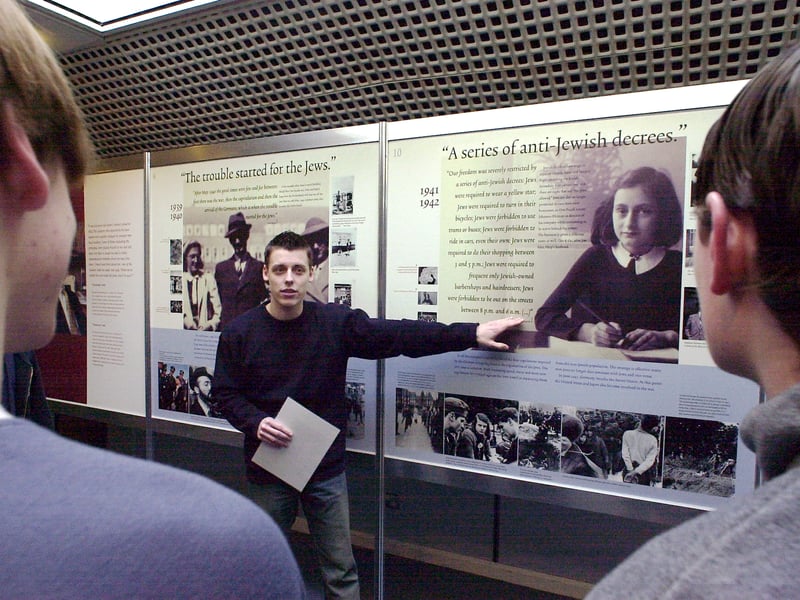 Exhibit Curator Immanuel Bartz discusses the life of diarist Anne Frank with students at South Downs College in 2003.
Picture: Jonathan Brady (030832-13)