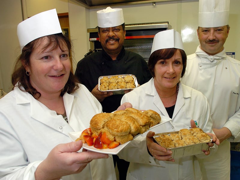 Healthier meals for the children - school dinner workers (left to right), Karen Lock from Bourne Community College, Clive Bagley from Cams Hill School and Carol Gerrard from Milton Cross School, pictured at South Downs College, College Road, Purbrook, with chef lecturer Paul Mansfield (right) in 2006.
Picture: Michael Scadden (060300-0011)