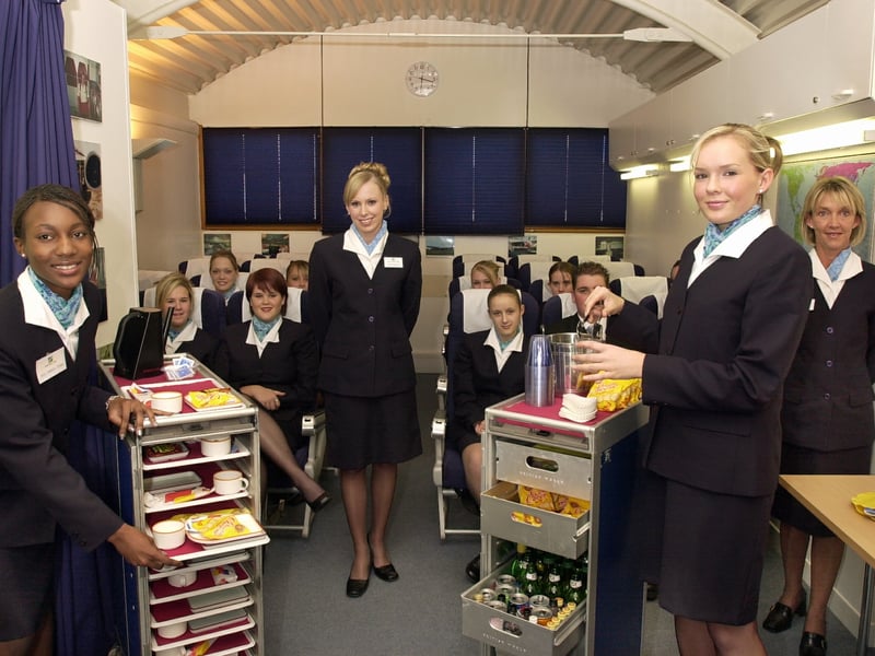 Cabin crew training at South Downs College, Purbrook, with (left to right) student Angeline Newbold (17), lecturer Jacqui Picton, student Danielle Edwards (17) and course manager Claire White, in the purpose equipped room to emulate an aircraft interior in October 2003.
Picture: Michael Scadden (035300-0003)