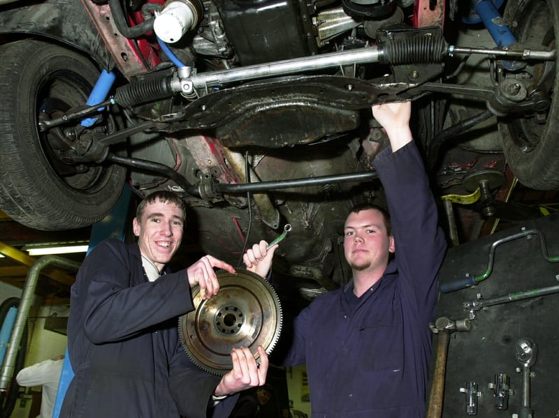 Servicing and repair course students, Drew Campbell (16) (left), and Paul Burden (17) (right), at South Downs College, College Road, Purbrook, installing the flywheel of a car gearbox, during their training in March 2003.
Picture: Michael Scadden