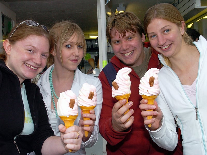 Cooling down with an ice cream after lessons at South Downs College, Purbrook , these students (left to right) Emma Chevis (17), Amy Doherty (17), Chris Ricketts (17) and Caroline Ward (17), pictured during the hot weather near South Parade Pier, Southsea in May 2006.
Picture: Michael Scadden (061939-0246)