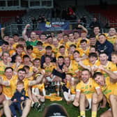 Clonduff celebrate winning the Frank O'Hare Cup after beating Burren in the Down Senior Championship Final on Sunday.