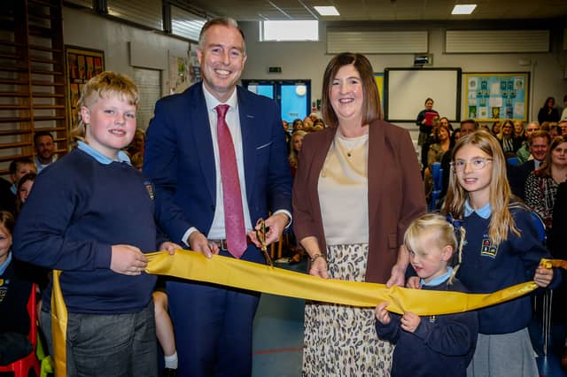 Education Minister Paul Givan is pictured at Killyman Primary School with Principal Deborah Mitchell and pupils.