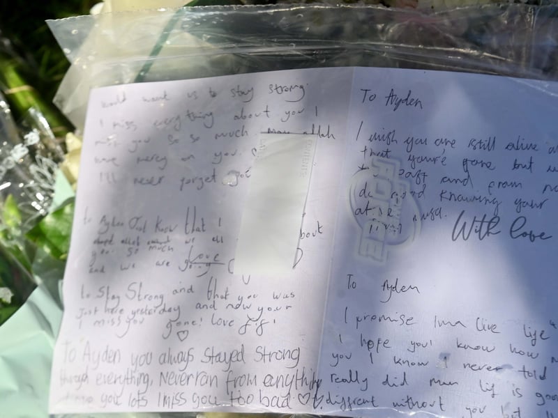 12 photos show touching tributes left to man murdered in Sutton ...