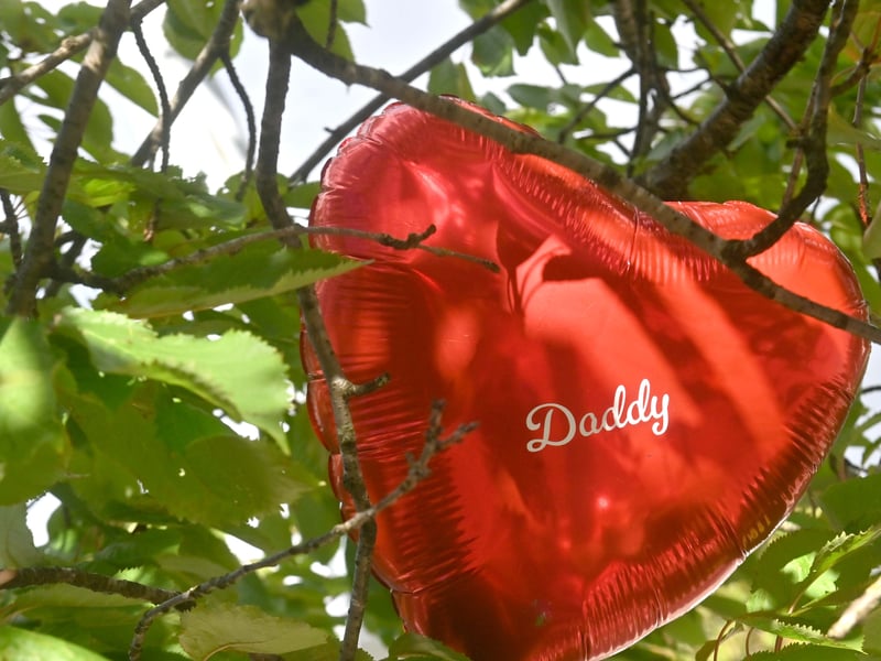 12 photos show touching tributes left to man murdered in Sutton ...
