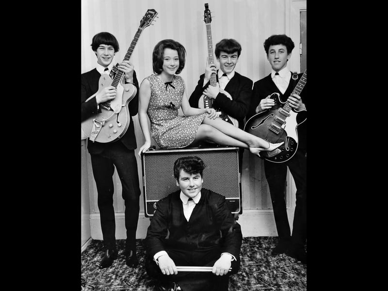 The 1960s Shropshire beat group The Van-Dels, who were the resident band at Terry Heath's Town House in Wellington. The picture is from around 1964 and a contemporary story said it showed the four lads and 13-year-old schoolgirl Lesley Whitehouse from Rosegrove, Wellington. "The group came fourth in the big beat contest held at Wellington two weeks ago. They still play regularly at the Town House, Wellington, on Saturday nights and Leslie (sic) tells me that she is hoping to record some original tunes in the near future..." Lesley went on to become a professional singer under the name Louisa Jane White. From left: Pat Horton, rhythm guitar, Lesley Whitehouse, in front Bruce Holcroft (drums), Clive Roberts on bass, and lead guitar and singer Les Darrell.