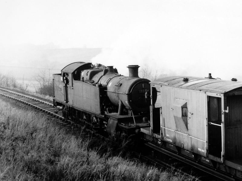 GWR 2-8-2 tank engine No. 7221 approaching Madeley junction circa 1955.