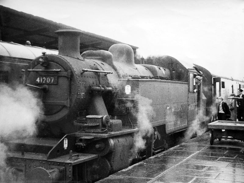 "Ivatt Class 2 2-6-2T No. 41207 with driver Bell (of Salop) in charge stands at Shrewsbury railway station with the last ordinary passenger train from Bridgnorth, the 19.27 from Bridgnorth, Saturday, September 9, 1963."