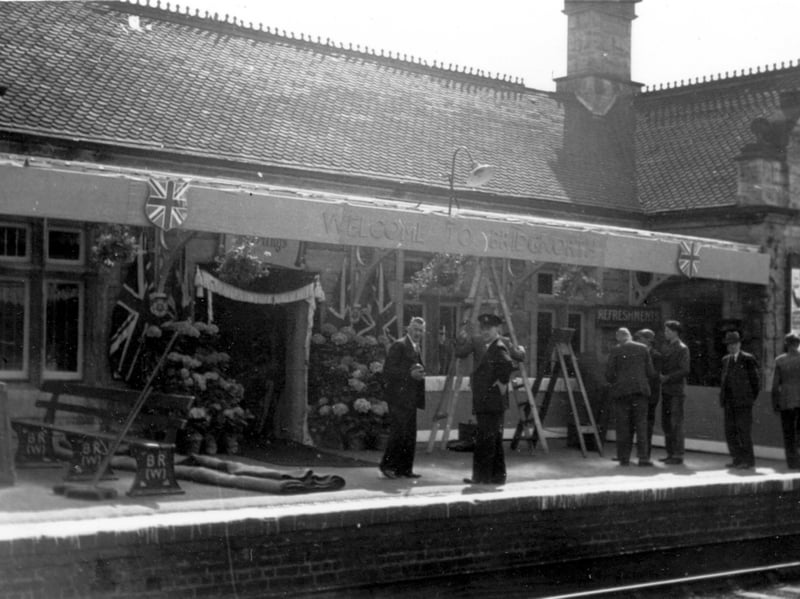 Bridgnorth railway station being decorated for that visit of the Duchess of Kent in late May 1957.