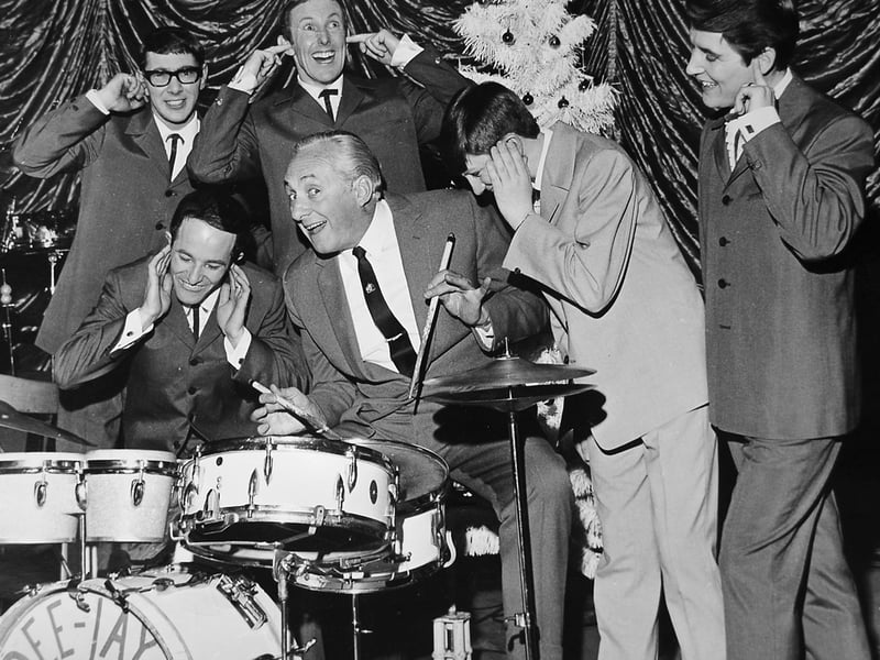 During entertainer Hughie Green's Christmas show at the Granada in Shrewsbury, a Shrewsbury vocal harmony group called the Dee Jays were so popular with audiences that they had their engagement extended. This picture dates from during the run in January 1969. A contemporary story said: "The Dee Jays appeared last week after winning a talent spotting competition and by popular request they are taking part in the show again this week. They are to appear in Hughie's Opportunity Knocks TV programme on February 10. Hughie is on the drums - much to the dismay of Rod Hollaway, Bryan Jones, George Silcock, Larry Tench, and Dave Craik."