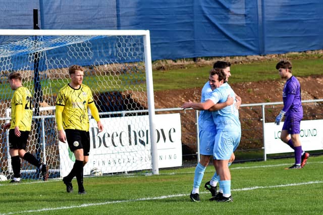 Portstewart celebrating their win against Knockbreda at the R KINGS Competition Stadium