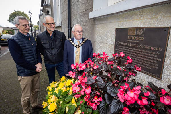 Mayor of Mid and East Antrim, Alderman Thomas Gordon, welcomes delegates from World Heritage UK to the UNESCO site at Gracehill.
