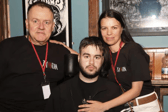 Adam (centre) pictured with his parents Greg and Ola at the 'Man of Steel festival' in his honour at the Róisín Dubh in August 2025