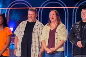 Corinna Maguire, second from the right wearing a beige cardigan, was made for this Netflix Show