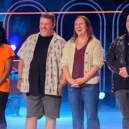 Corinna Maguire, second from the right wearing a beige cardigan, was made for this Netflix Show
