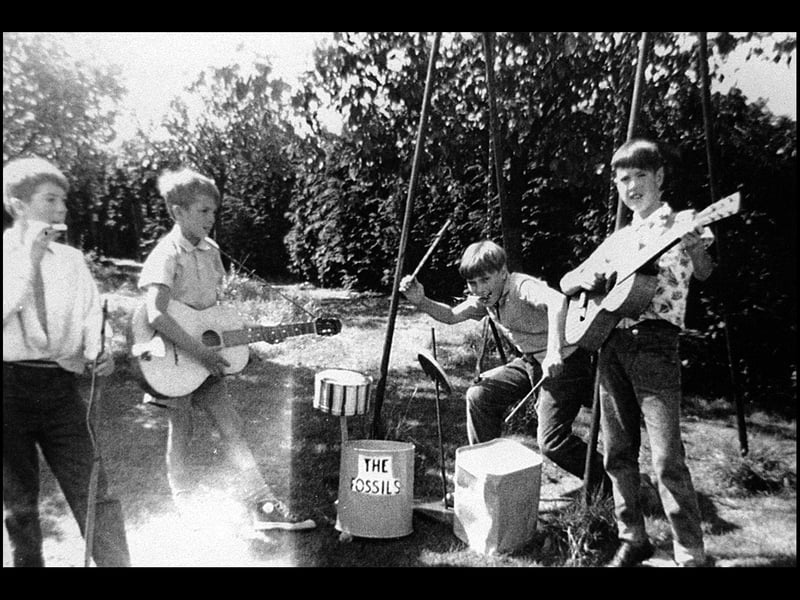 The Fossils practising at Little Minsterley in the mid-1960s. It would be fitting to say The Fossils were playing rock, but they were only about 11 or 12 at the time and were just pretending. Right is Pete Francis, with Christopher and David Perrett, while the lad on the drums is unidentified. They are in the gardens of the Gylands, Little Minsterley, which was the Perrett family home.
