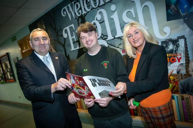 WELL DONE GARY!. . . .Mrs. Ciara Deane, Principal and Mr. Gerry Beattie, Vice Principal, St. Joseph's Boys School congratulating former pupil and current classroom assistant Gary Breslin on the success of his debut play 'The Body of Bobby' which played to packed audiences over the weekend at the Millennium Forum, Derry. (Photos: Jim McCafferty Photography)