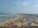 Summer crowds on Portrush’s East Strand