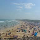 Summer crowds on Portrush’s East Strand