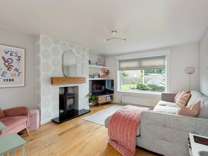 The generous open-plan living, dining and kitchen space, featuring engineered oak flooring, providing a great space for relaxing or entertaining.