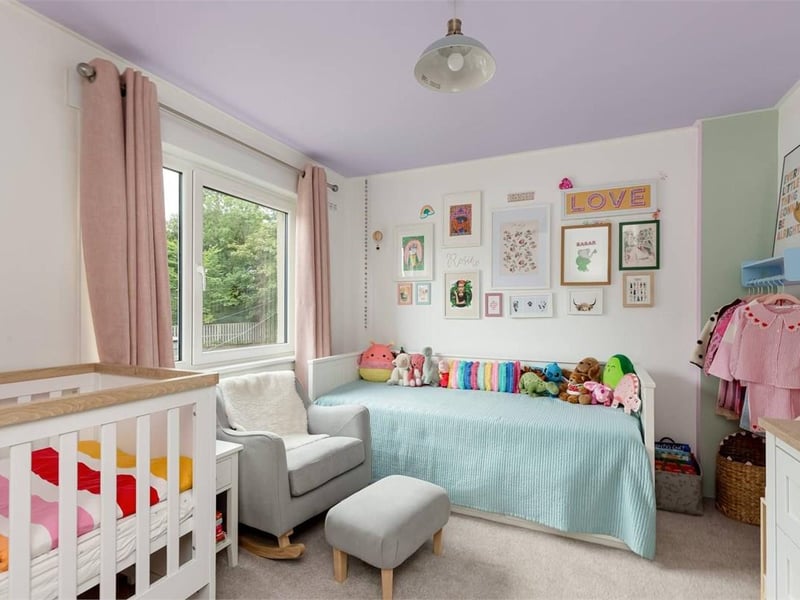 The second double bedroom, overlooking the rear garden. There is also a Ramsay ladder providing convenient access to the loft.
