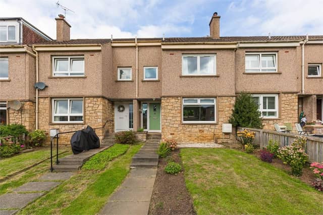 The property enjoys extensive lawned gardens to the front, attractively complemented by established shrub borders and planted beds. Unrestricted on-street parking is available immediately outside the property.