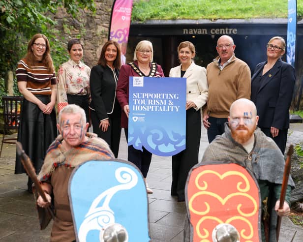 L-R: Etta Austin, Tourism Ireland, Caitriona O'Connor, Royal Sites of Ireland Project Co-Ordinator, Jo Scott - Compere, Lord Mayor Councillor Mary O’Dowd, Charlene Stoops, Interim Chief Executive ABC Council, Chris Mallon, Armagh Road Bowling Experience and Adrienne Moffett, Gilford Castle Estate with Navan Living History Characters. 
