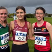 Neasa Ní Ainiféin of University of Galway (centre), with silver medalist, Claire O'Grady of UL (left,) and bronze medal winner, Saoirse Twomey of UCC.
