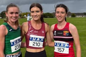 Neasa Ní Ainiféin of University of Galway (centre), with silver medalist, Claire O'Grady of UL (left,) and bronze medal winner, Saoirse Twomey of UCC.