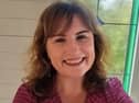 Louise Burchall's interest in laughter yoga developed due to her late father's illness. 