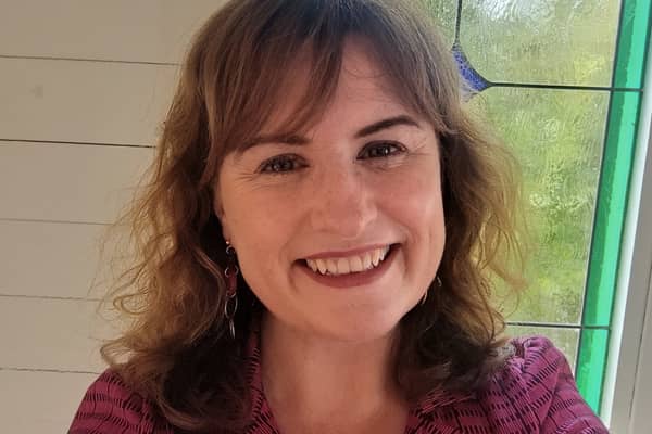 Louise Burchall's interest in laughter yoga developed due to her late father's illness. 