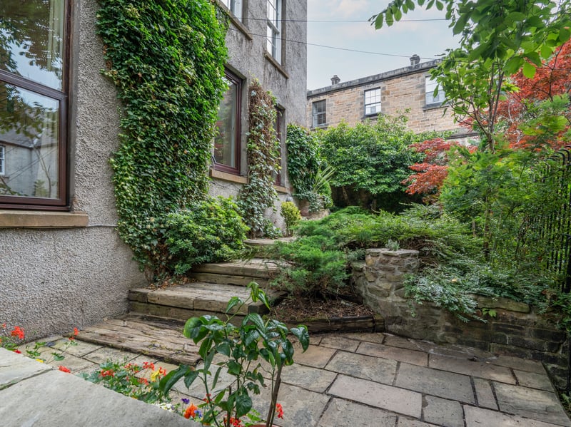 The garden offers a wonderful level of privacy with mature trees, well-stocked borders, a central lawn and sheltered stone patio creating an idyllic setting for outdoor dining and relaxation. There is also a useful timber garden shed and a separate drying area. Despite being just moments from the bustle of the Grassmarket, the garden feels remarkably peaceful and secluded. A separate cellar provides additional storage space.