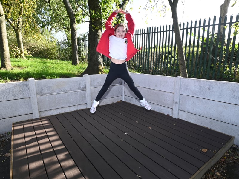 Taking centre stage - a stage platform with seating around is included in the playground design.