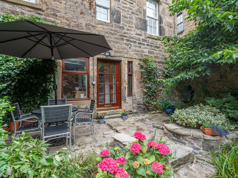 Tucked away behind its own private gate, moments from the vibrant atmosphere of the Grassmarket, this unique B-Listed garden flat offers a rare combination of tranquillity, character and generous living space in the very heart of Edinburgh's historic Old Town.