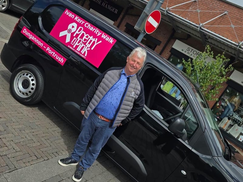 Ivan is pictured beside the 'Pretty n Pink' van at the Linen Green, Moygashel.
